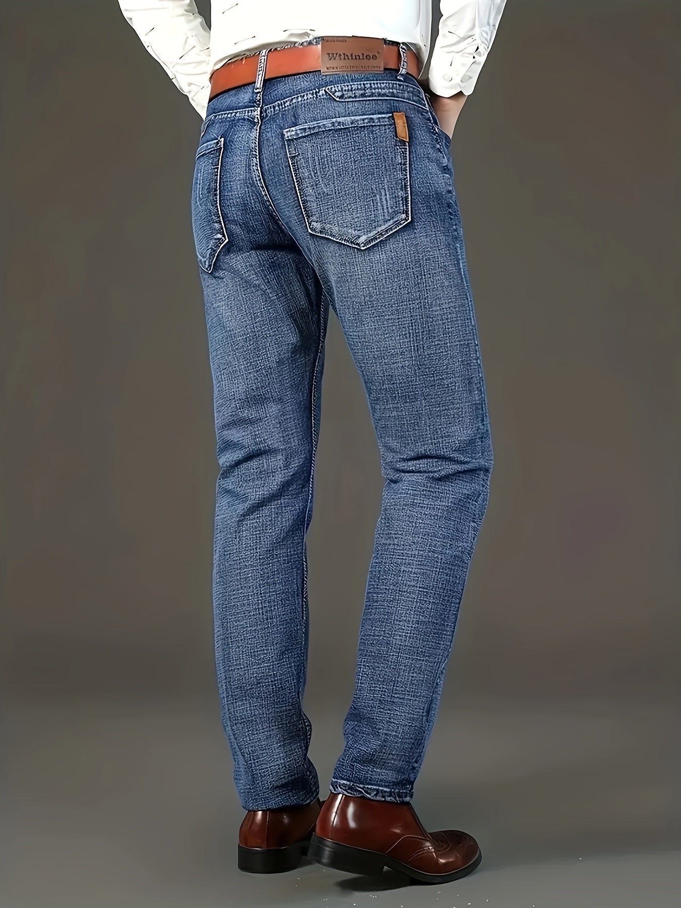 Pantaloni classici in denim finto per uomo, in un'edizione stagionale, con un design comodo e elasticizzato a gamba dritta, adatti per un lavoro casual o d'affari.