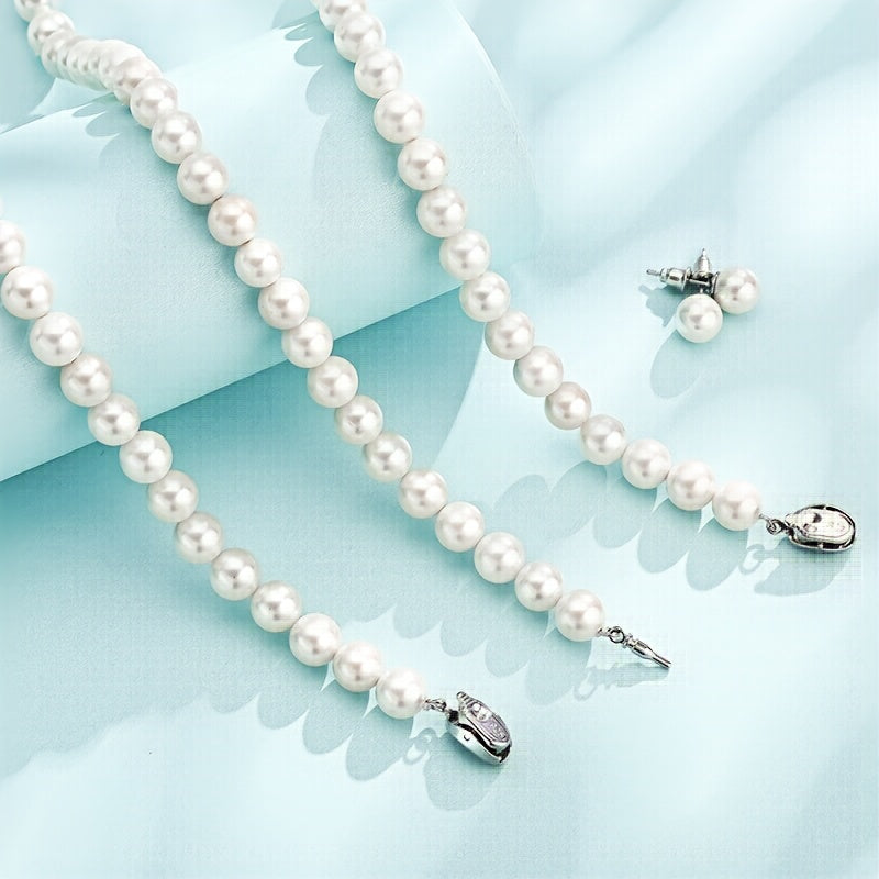 Set di gioielli da donna in argento 925, composto da perle d'acqua dolce, collana, orecchini e bracciale. Elegante e lussuoso, adatto a varie occasioni come regali, feste serali, accompagnato da una bella scatola regalo.