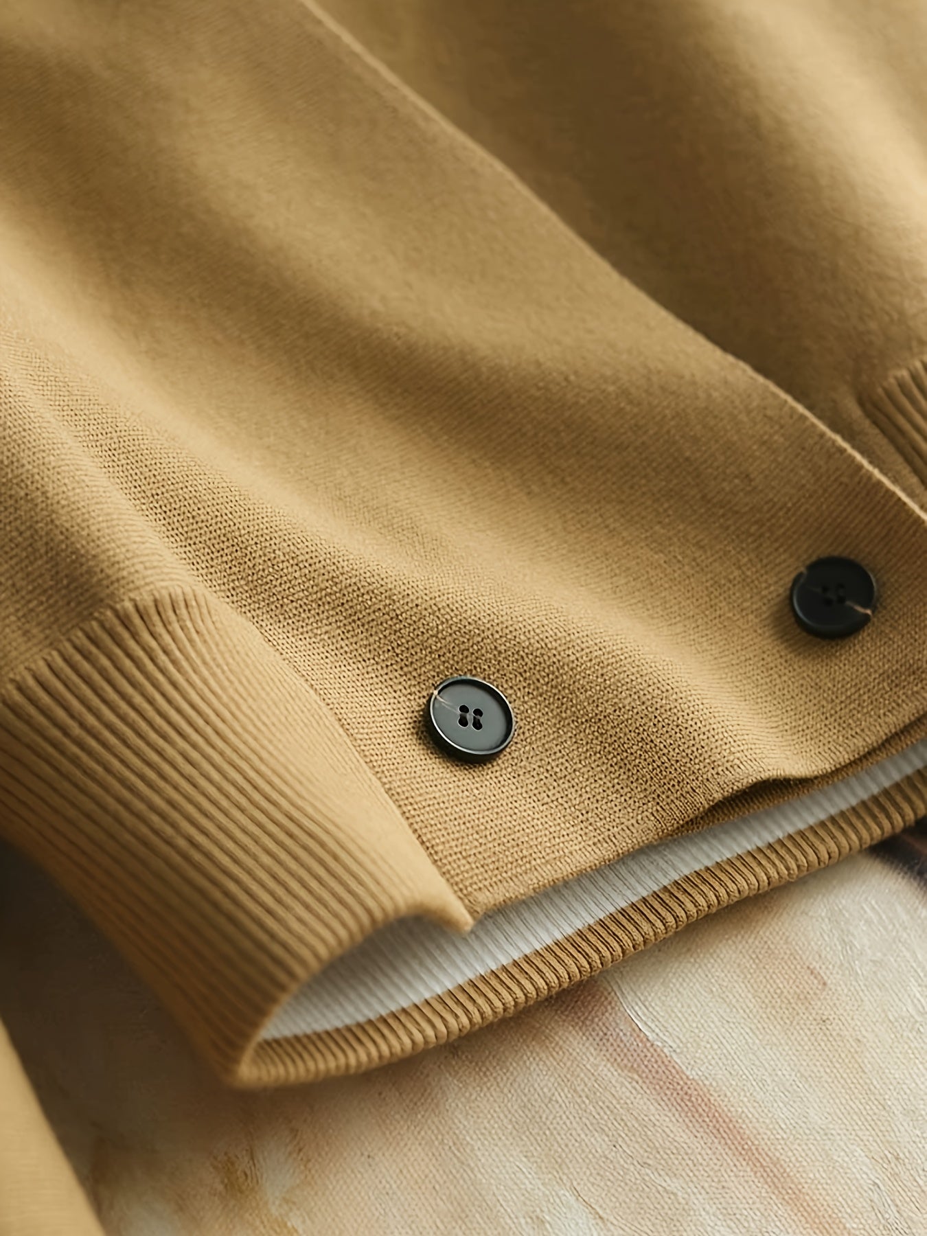 Abbigliamento da donna di alta gamma per l'autunno e l'inverno 2025, con un semplice e due pezzi set con un'atmosfera alla moda.