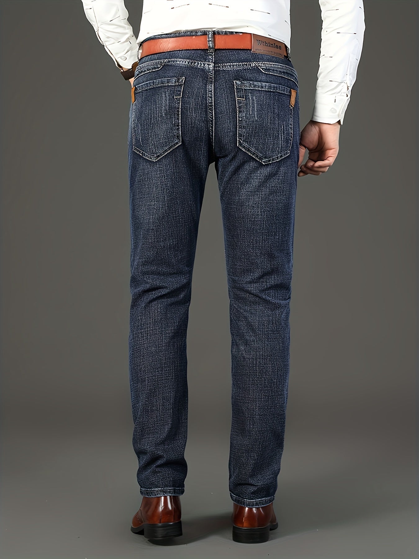Pantaloni classici in denim finto per uomo, in un'edizione stagionale, con un design comodo e elasticizzato a gamba dritta, adatti per un lavoro casual o d'affari.