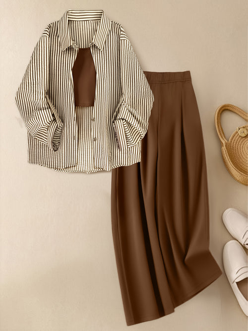 Set di 3 pezzi per donna: top a righe alla moda, camicia, gilet tinta unita e pantaloni larghi comodi, outfit elegante ma casuale, completo da lavoro femminile, abbigliamento trendy ed adatto al contesto professionale. Combinazione versatile con maglia à