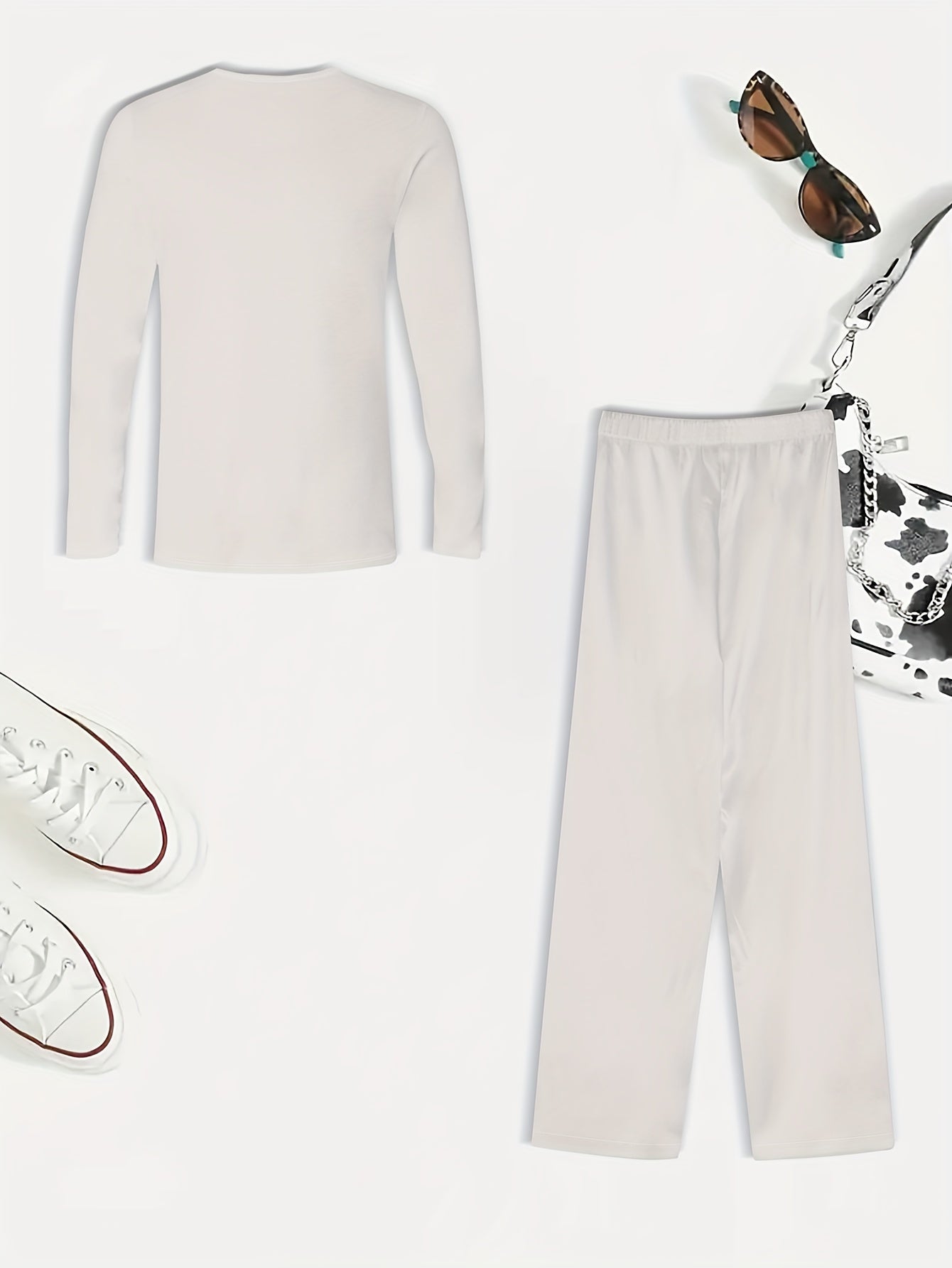 Nuovo set di magliette casual da donna con maniche lunghe e scollo rotondo, set classico semplice in tinta unita, maglietta con maniche lunghe e scollo rotondo e pantaloni casual per le vacanze e l'abbigliamento casual.