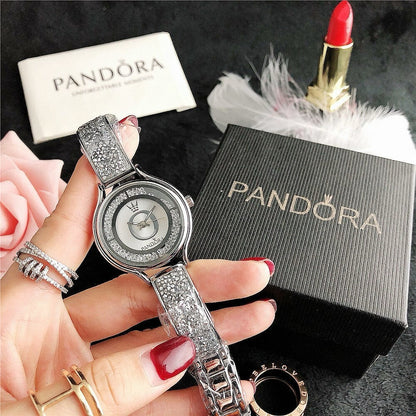 P A N D O R A Mirela