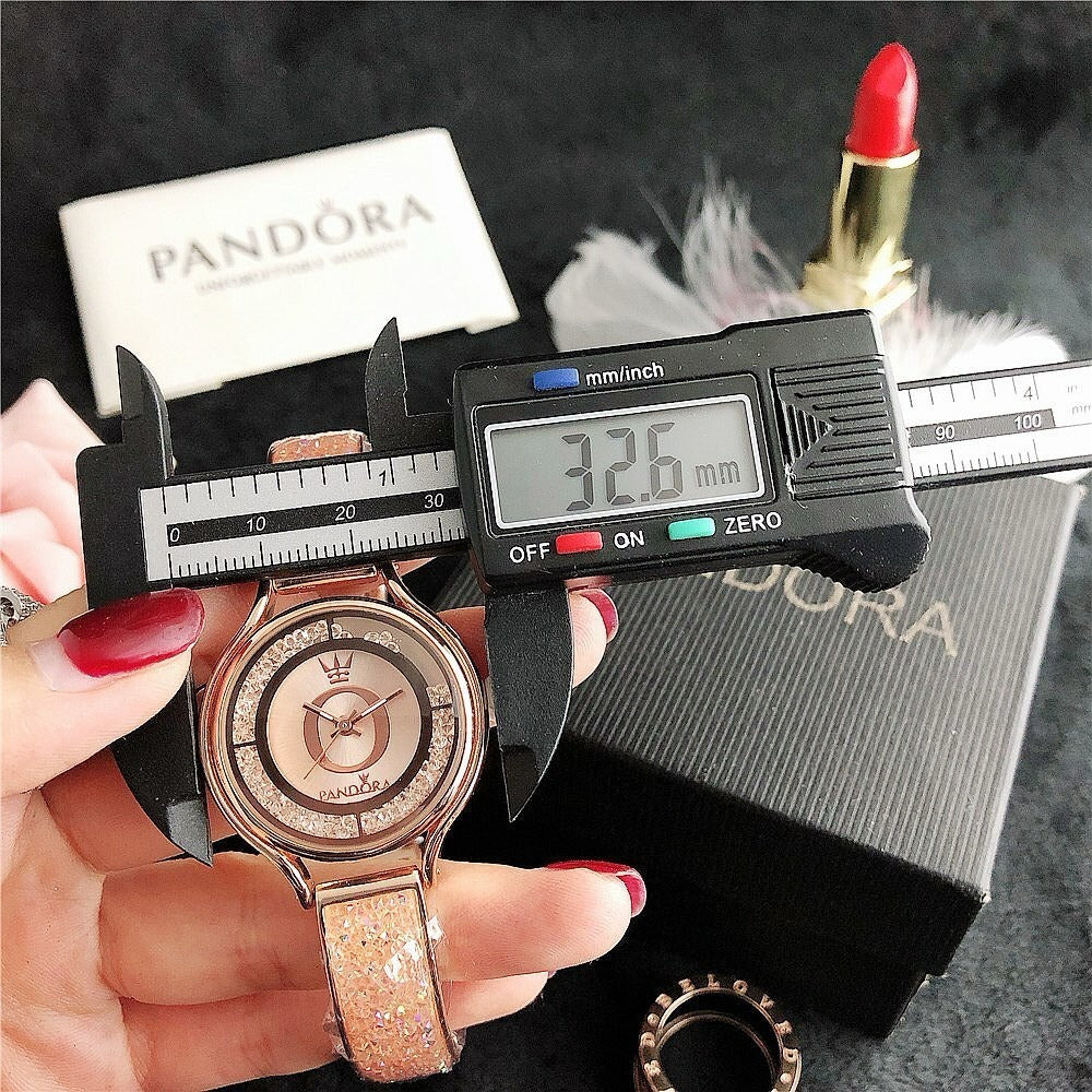 P A N D O R A Mirela