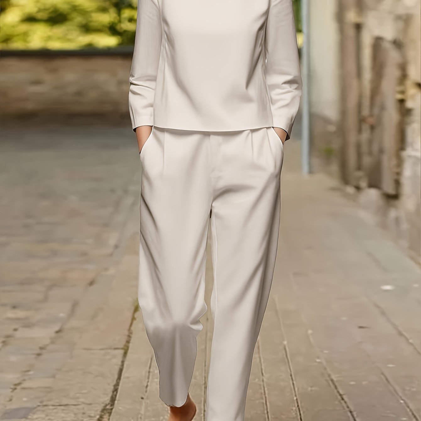 Nuovo set di magliette casual da donna con maniche lunghe e scollo rotondo, set classico semplice in tinta unita, maglietta con maniche lunghe e scollo rotondo e pantaloni casual per le vacanze e l'abbigliamento casual.