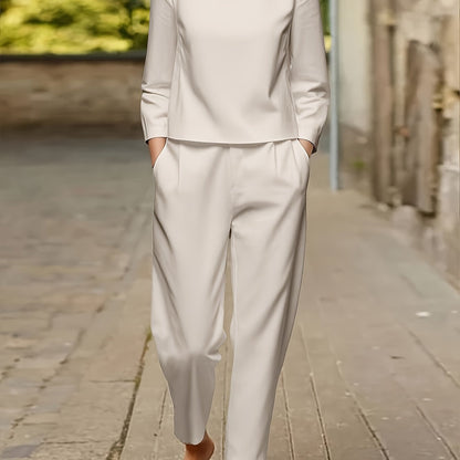 Nuovo set di magliette casual da donna con maniche lunghe e scollo rotondo, set classico semplice in tinta unita, maglietta con maniche lunghe e scollo rotondo e pantaloni casual per le vacanze e l'abbigliamento casual.