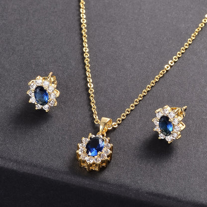 Véora - Kit di gioielli a tema girasole con zirconi lucidi taglio ovale intarsiati con collana con pendente e orecchini a bottone